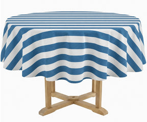 A round table covered with a blue and white striped tablecloth, shown on a light wood pedestal against a plain white background.
