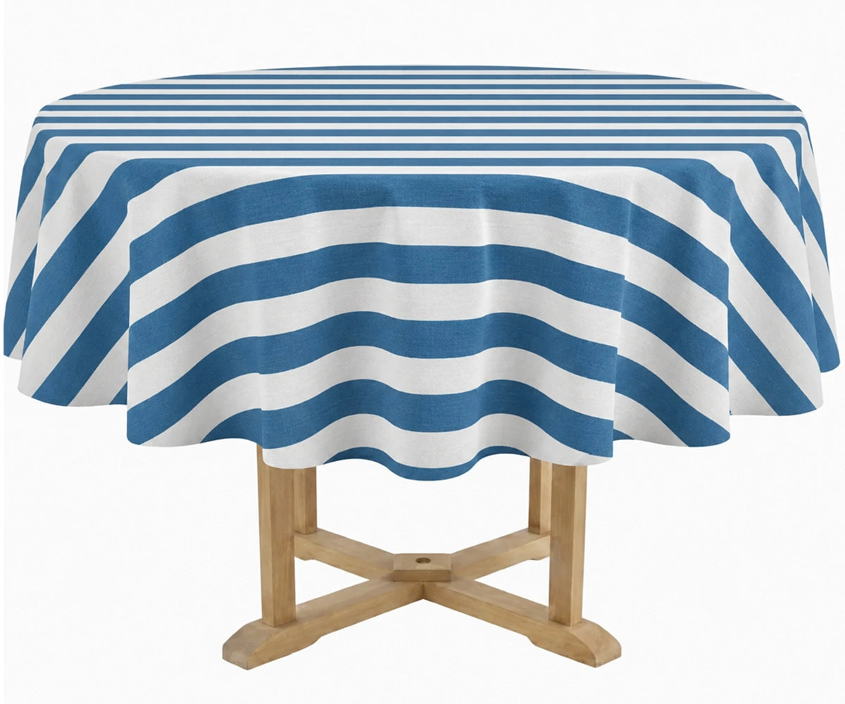 A round table covered with a blue and white striped tablecloth, shown on a light wood pedestal against a plain white background.