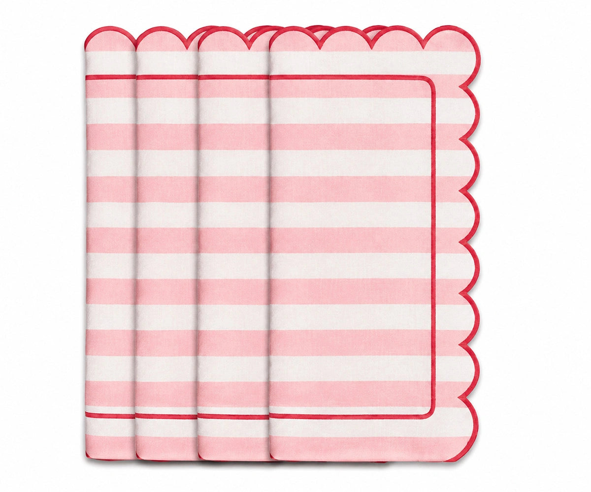 Blush pink and white striped cloth napkin with scalloped edges and red trim for romantic table decor