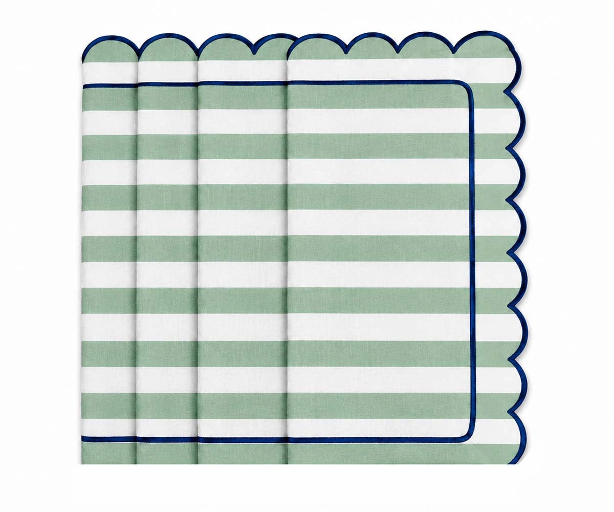 Green striped table napkin with navy blue border, decorative dining accessory for brunch, casual dinners, family meals, outdoor entertaining, and special occasions