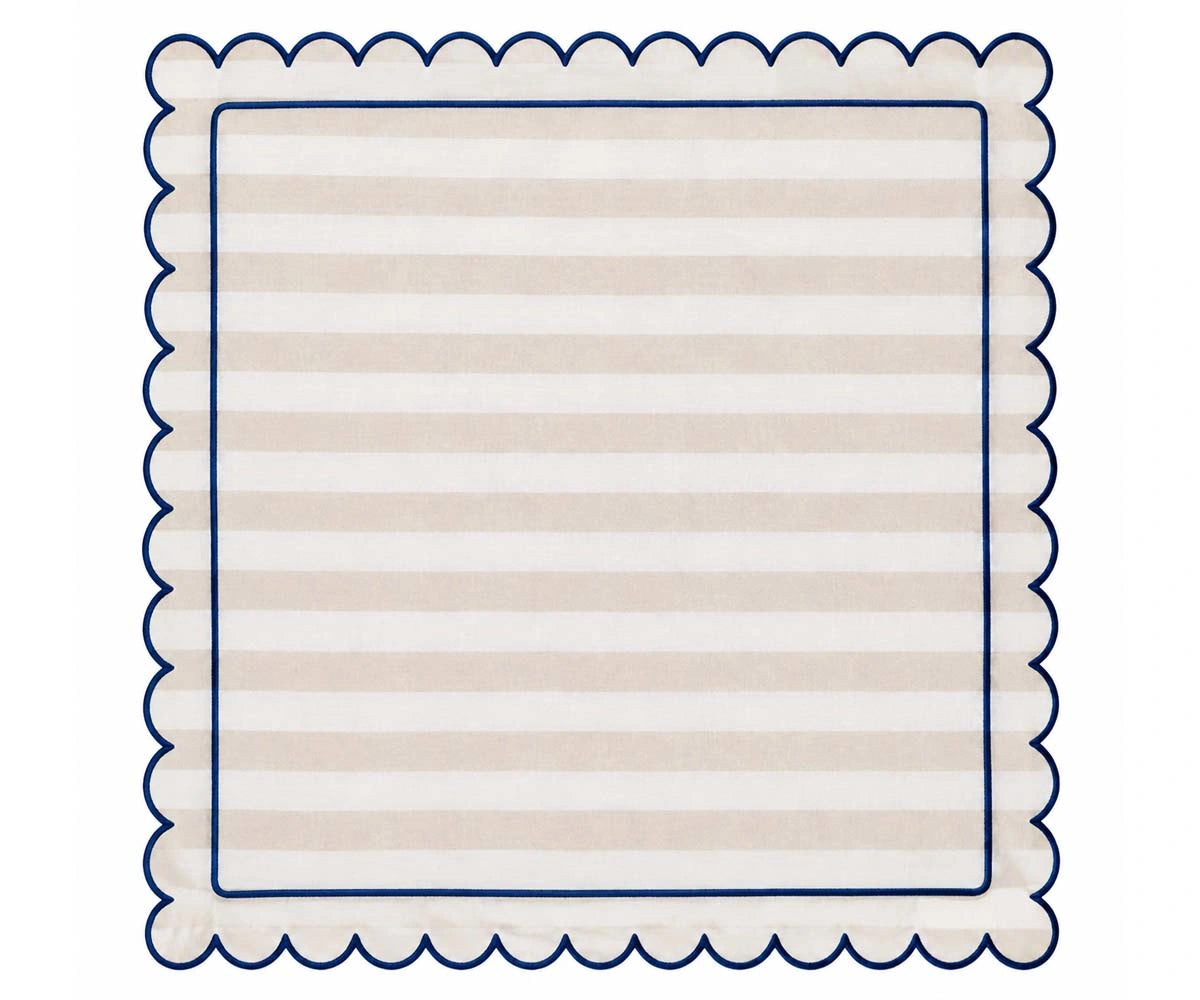 Ivory white cabana stripe scalloped cloth napkin with navy edging for coastal dining and sophisticated table settings