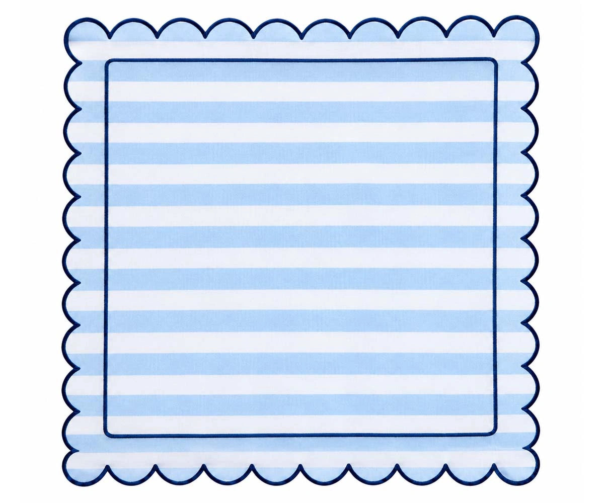 Light blue white cabana stripe scalloped cloth napkin with navy edging for summer dining and beach-inspired table settings