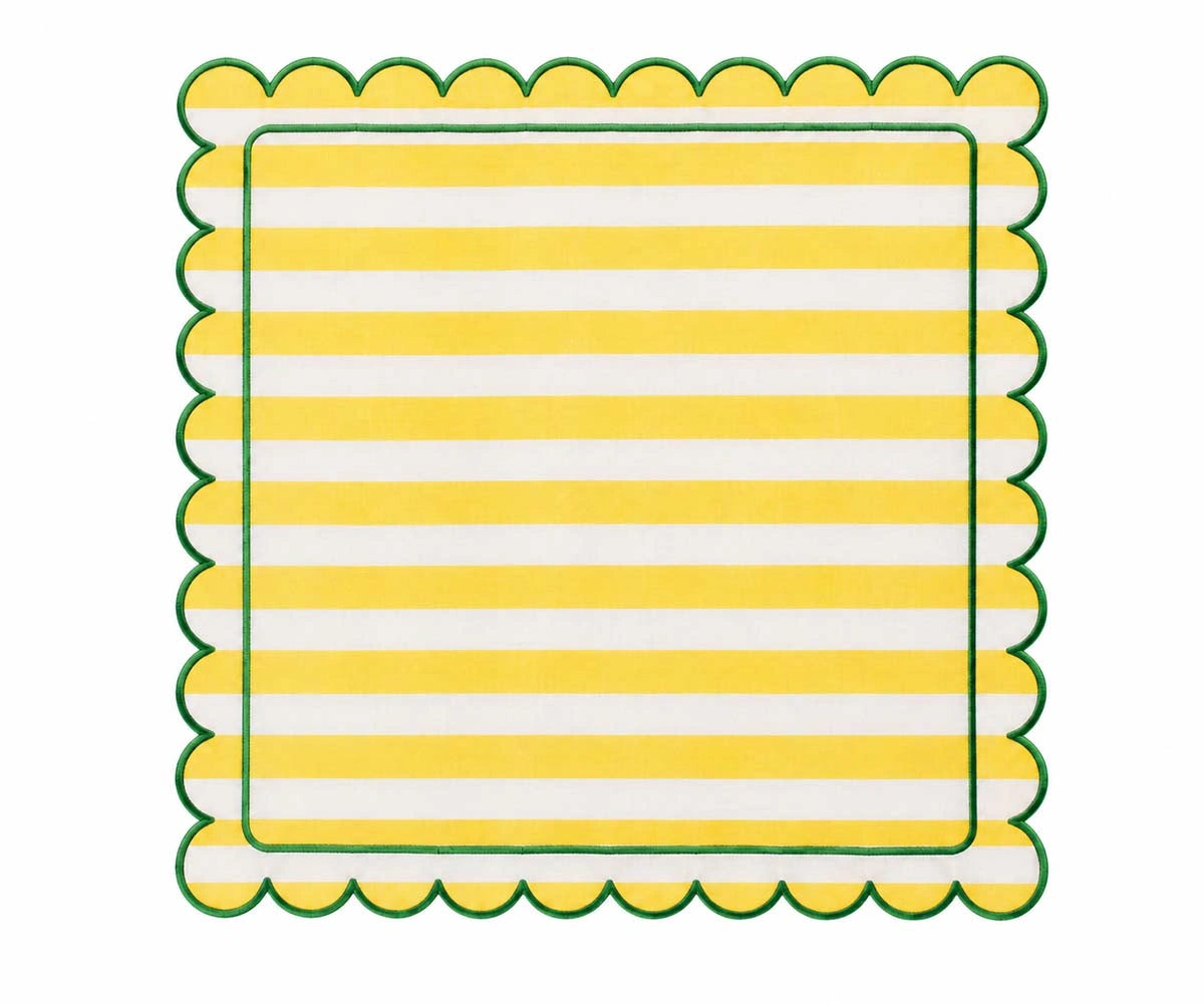 Yellow and green striped cotton napkin with decorative scalloped edge trim, colorful cloth table napkin for dining table setting.
