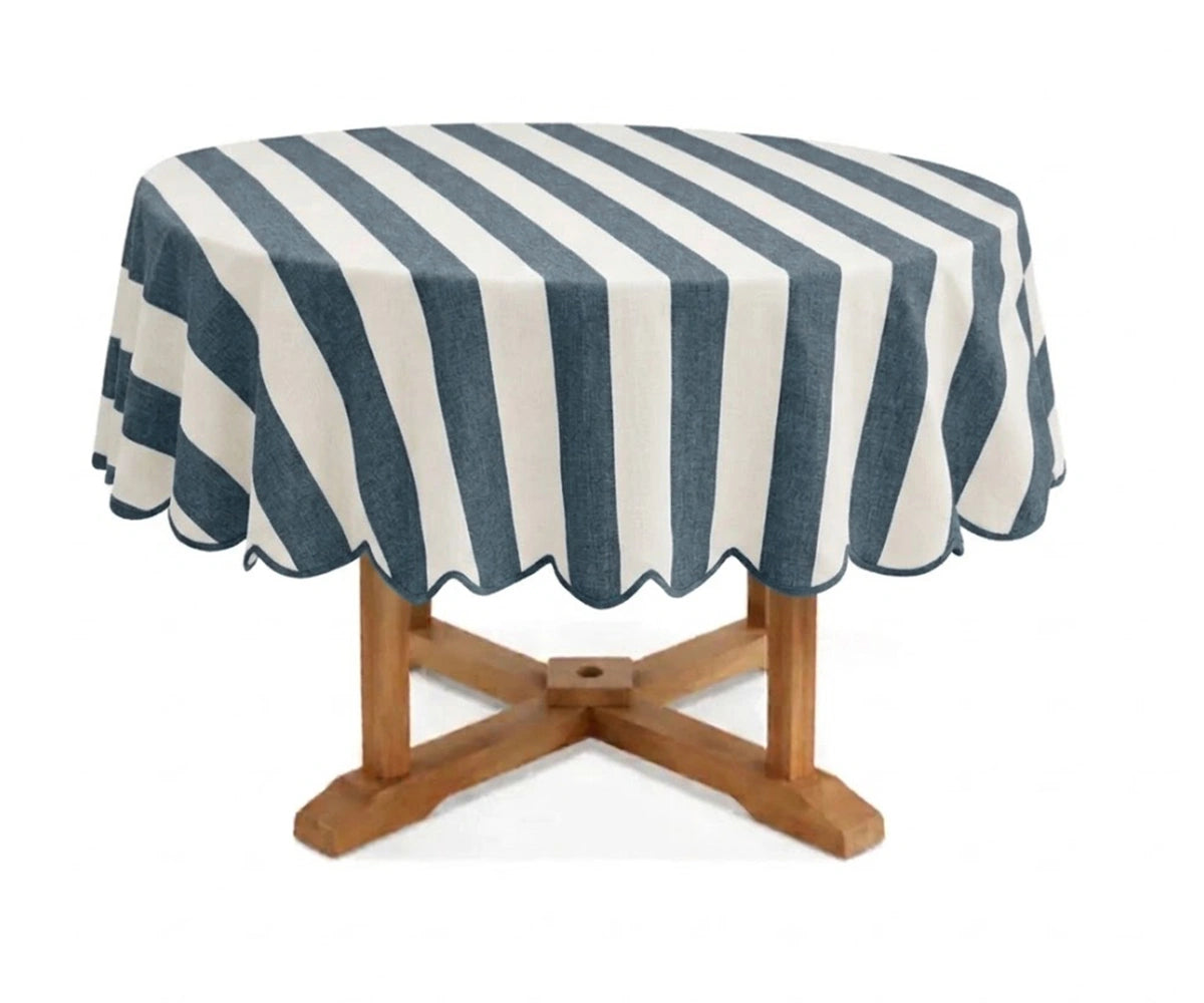 Ocean blue and white cabana striped round tablecloth with scalloped border, cotton linen blend table cover for coastal décor, summer entertaining, outdoor dining, and family gatherings