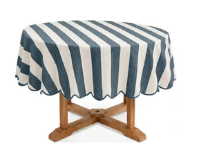 Ocean blue and white cabana striped round tablecloth with scalloped border, cotton linen blend table cover for coastal décor, summer entertaining, outdoor dining, and family gatherings