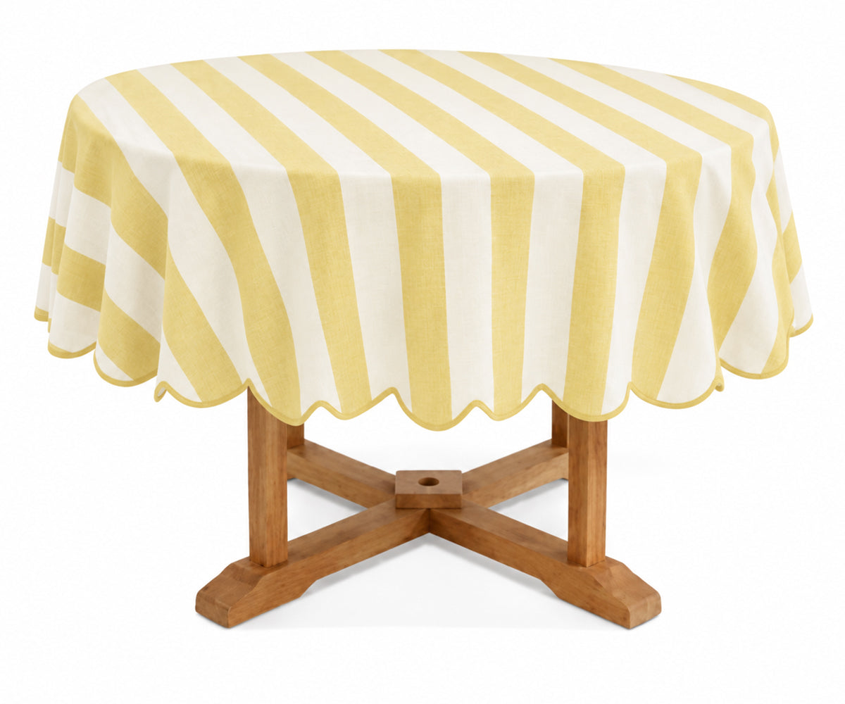 Butter yellow round cotton tablecloth with a soft warm tone for cheerful and inviting dining decor