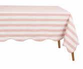 Pink and white striped tablecloth on rectangular table