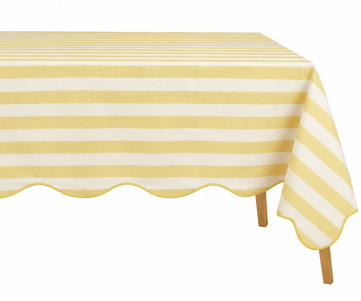 Butter yellow striped cotton tablecloth with scalloped edge for bright and inviting dining decor
