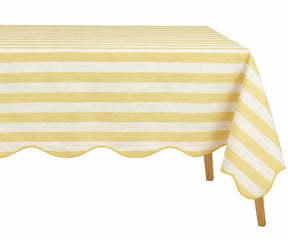 Butter yellow striped cotton tablecloth with scalloped edge for bright and inviting dining decor