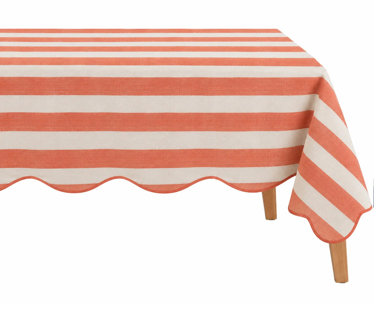 Rust orange striped scalloped tablecloth for dining table, orange table linen with wavy edge for Thanksgiving décor, fall gatherings, farmhouse dining, and seasonal entertaining