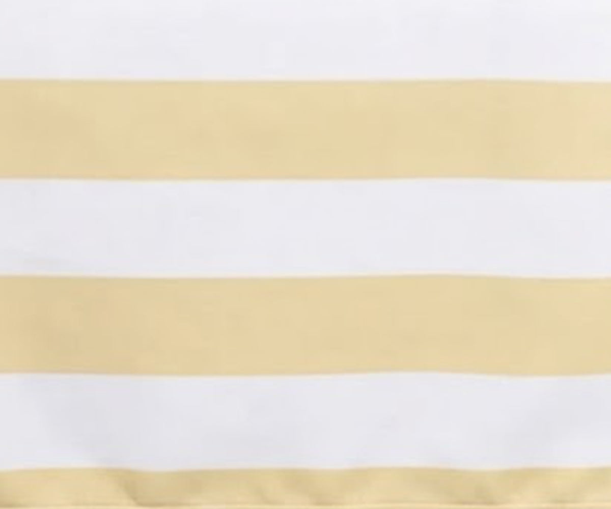 Close-up fabric view of a vintage butter yellow and white wide cabana striped cotton tablecloth.