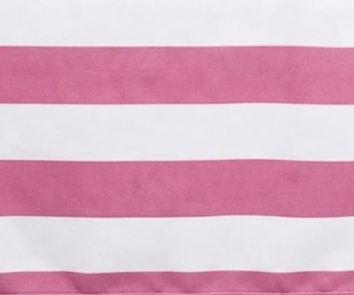 Close-up fabric view of a  pink blush and white wide cabana striped cotton  tablecloth.