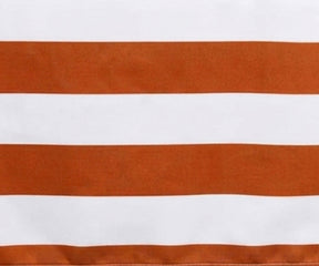 Close-up fabric view of a terracotta and white wide cabana striped cotton  tablecloth.