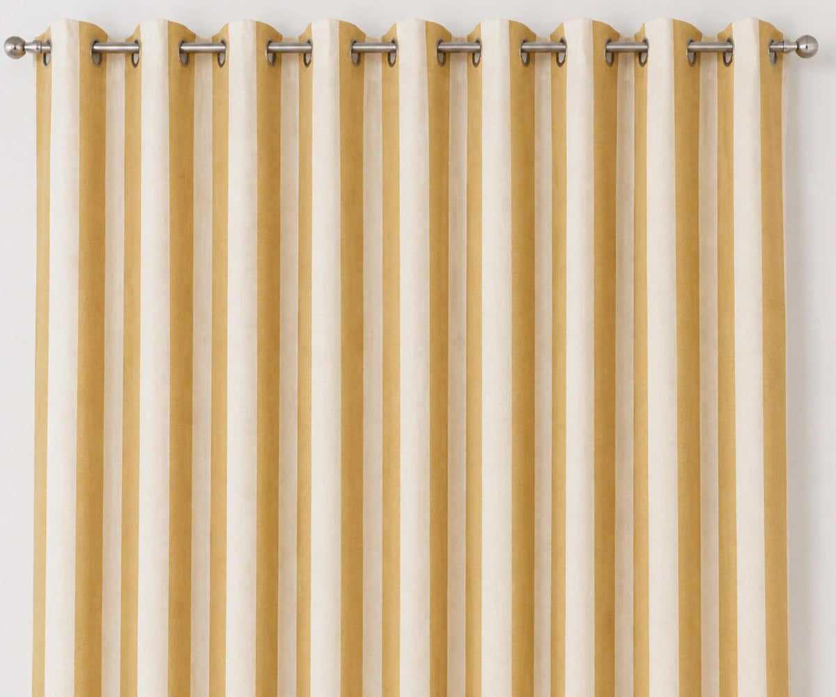 Yellow striped cotton curtains with classic vertical cabana stripes, breathable washable cotton fabric, and a relaxed drape for living room and dining room windows.