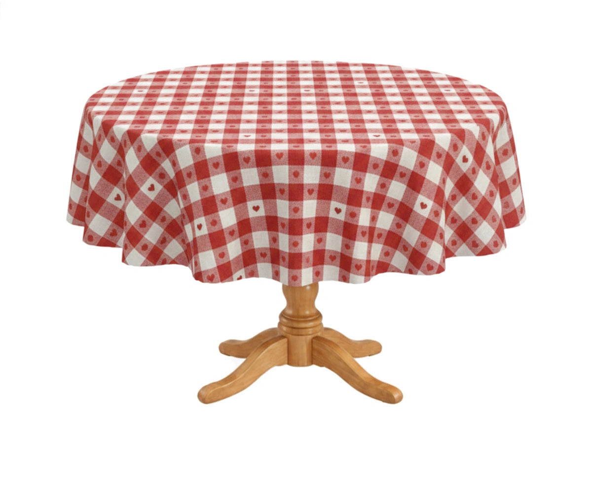 Red and white gingham round tablecloth on wooden pedestal table