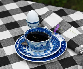 Adding a black linen tablecloth to your dining setup is a simple yet effective way to infuse elegance and style into any occasion. 