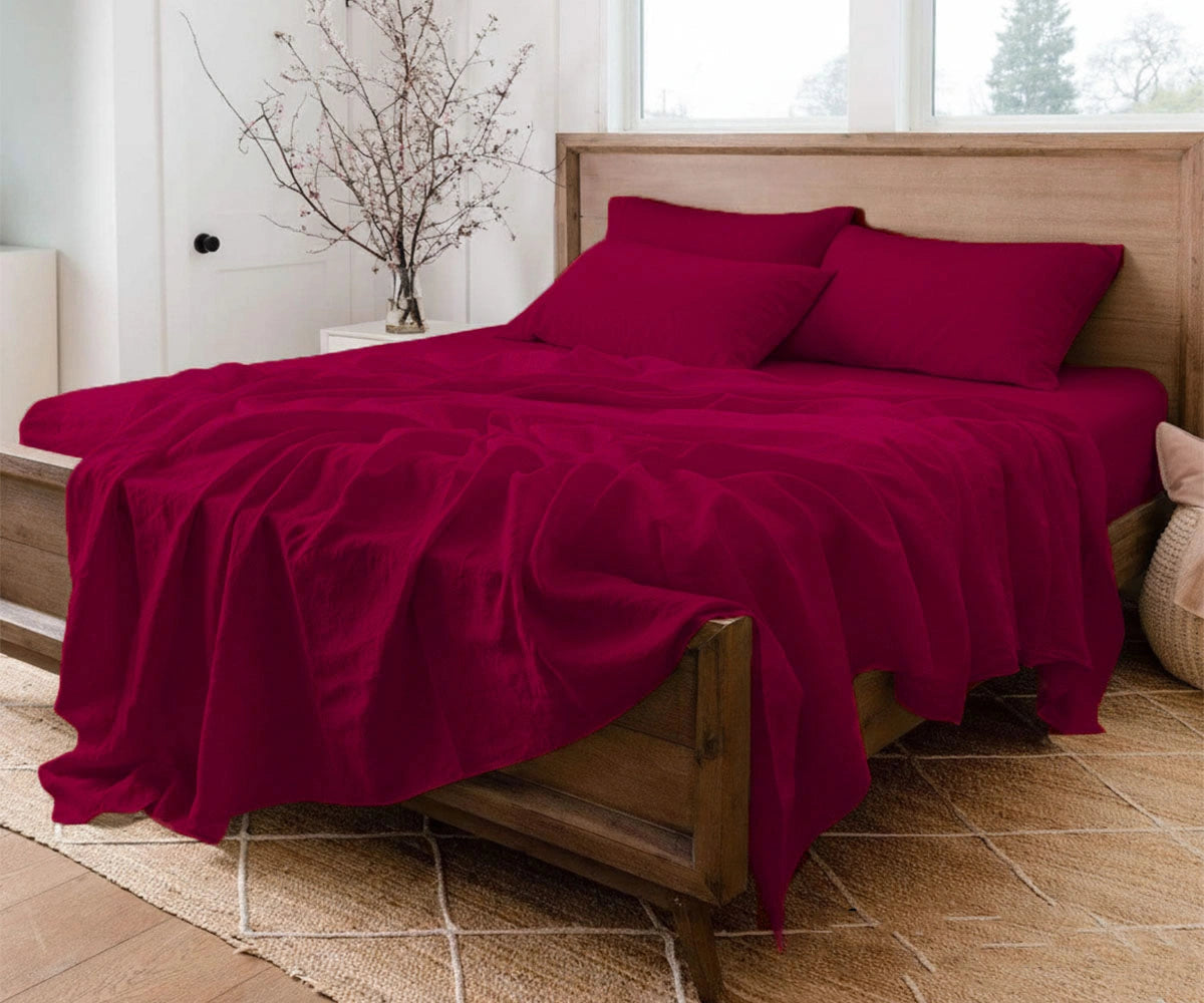 Cherry red 100% linen bed sheet set with deep pocket fitted sheet, breathable and temperature regulating for all-season comfort.