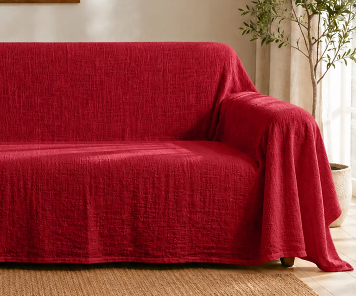 Breathable linen couch cover that helps protect sofas while adding a clean and elegant finish.