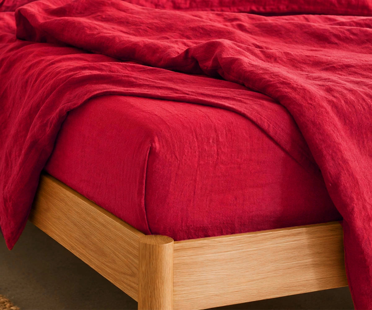 Cherry Red European linen fitted sheet set made from 100% flax linen with deep pockets, breathable luxury fitted bed sheet for queen, king, twin, and California king mattresses