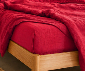 Cherry Red European linen fitted sheet set made from 100% flax linen with deep pockets, breathable luxury fitted bed sheet for queen, king, twin, and California king mattresses