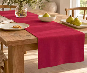 Red 100% linen table runner adding a warm accent to dining tables and festive table settings