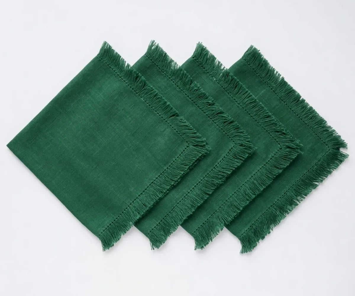 Fringe edge cotton table napkins made from soft woven cotton, suitable for weddings, parties, restaurants, and home dining tables.