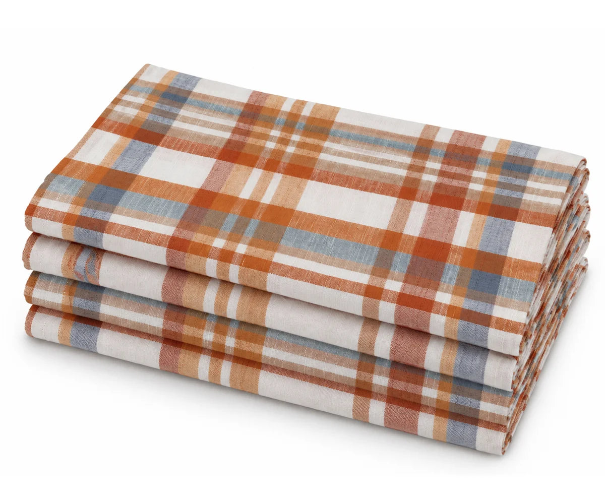Cloth plaid napkins in rust orange, blue, beige, brown, and white cotton check pattern