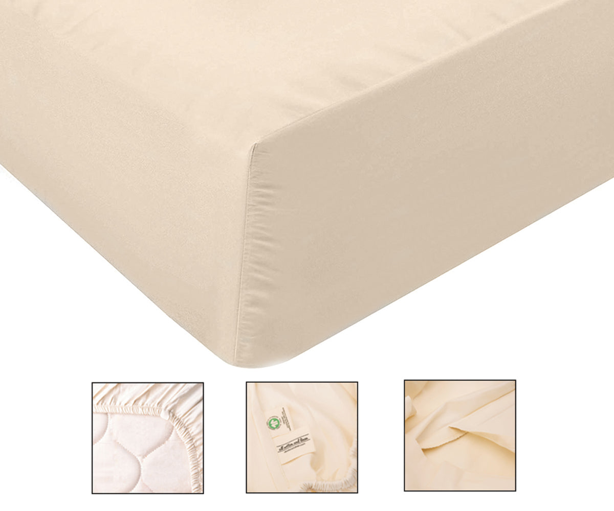 Fitted sheet made from organic cotton draped over a mattress