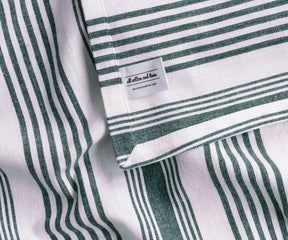 Green and white striped cotton tablecloth for everyday family meals and brunch