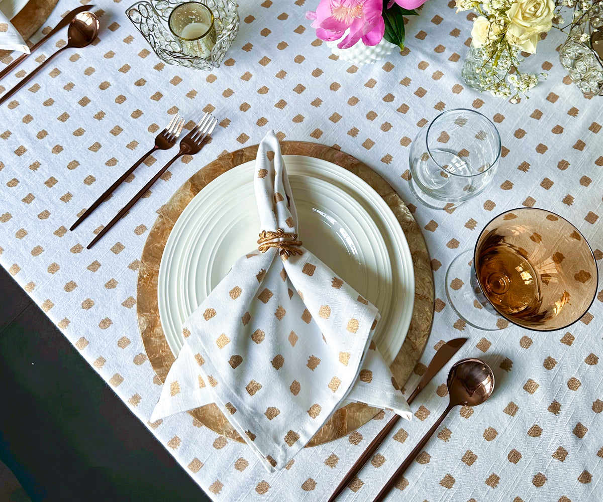 Make a statement with block printed napkins, showcasing intricate designs and patterns that effortlessly enhance your table decor.