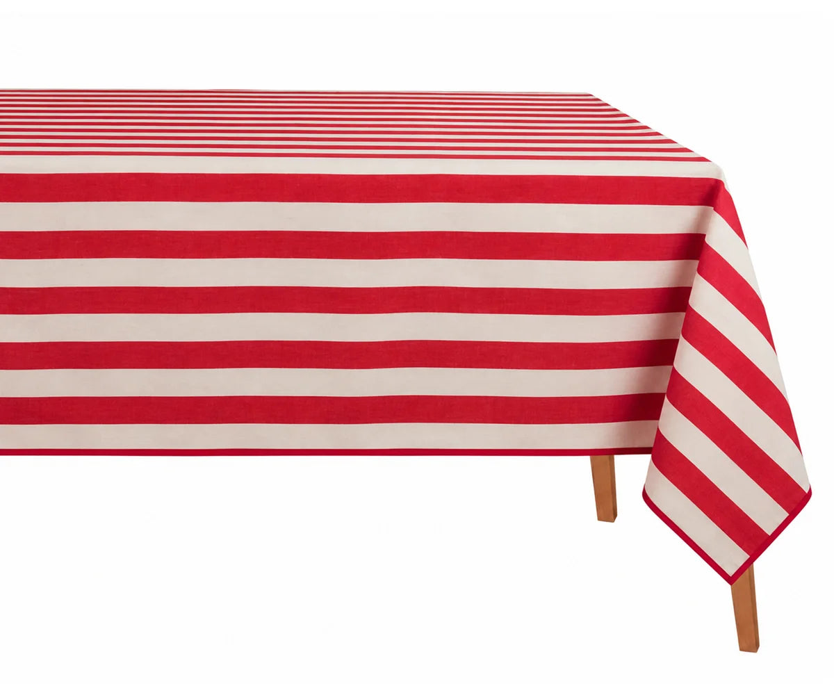 A rectangular table covered with a red and off-white horizontally striped tablecloth, shown against a plain white background with the corner of the cloth draped over the side and the wooden table legs visible.