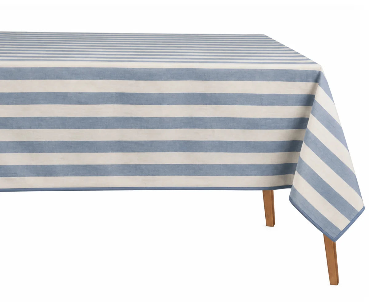 A rectangular table covered with a blue and off-white striped tablecloth, shown against a plain white background with the table legs visible underneath.