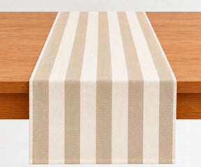 Washable cotton table runner with classic stripes for creating an inviting dining table setting throughout the year