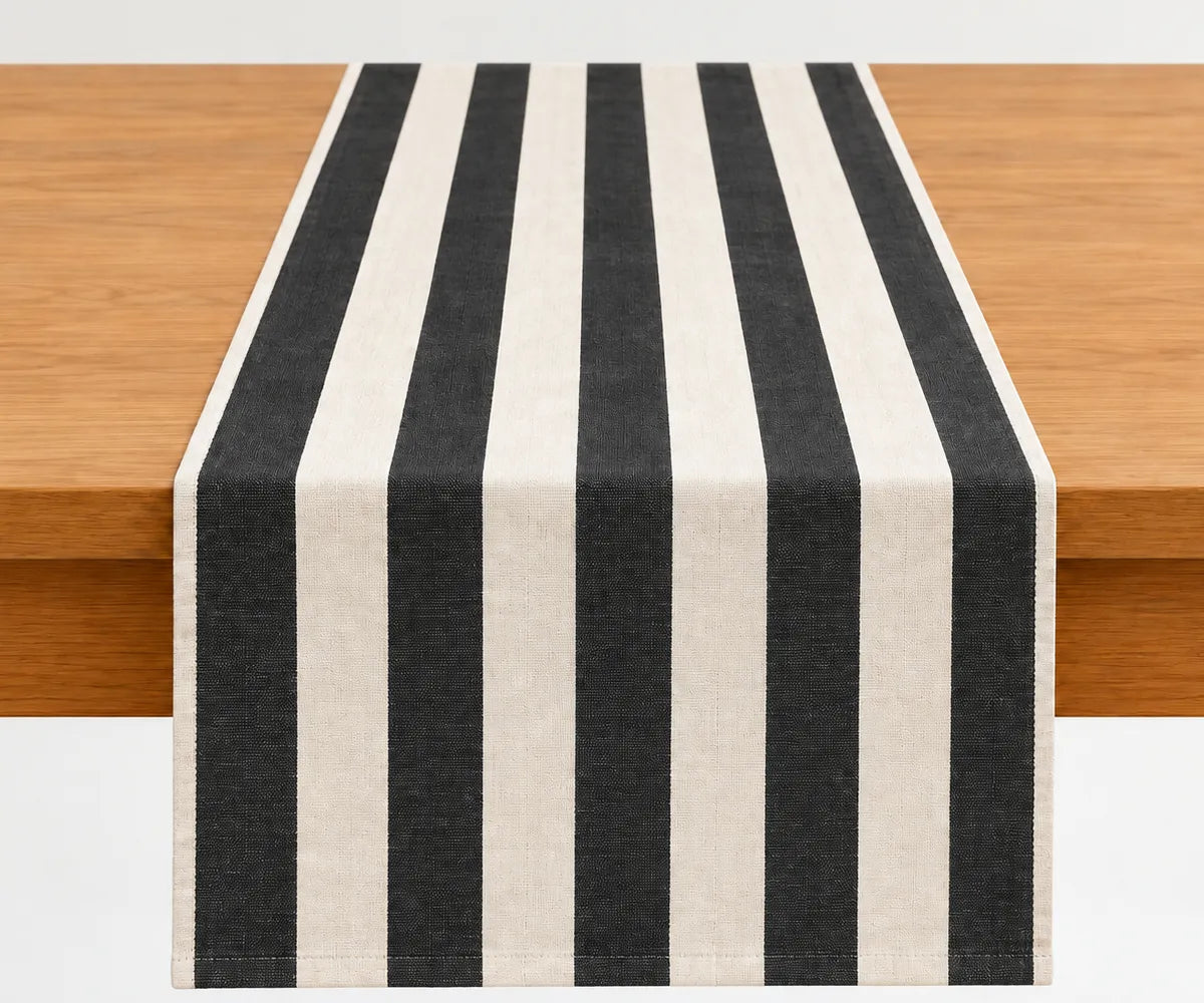 Cotton dining table runner with a relaxed cabana stripe pattern that pairs easily with napkins, placemats, and table linens