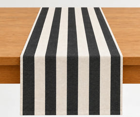 Cotton dining table runner with a relaxed cabana stripe pattern that pairs easily with napkins, placemats, and table linens