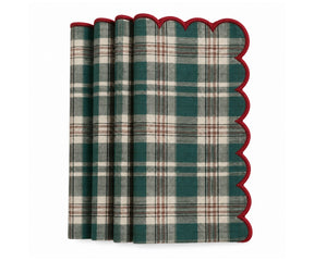 Green plaid holiday napkin with red scalloped border, decorative Christmas table napkin for festive dinners, family meals and seasonal table settings.