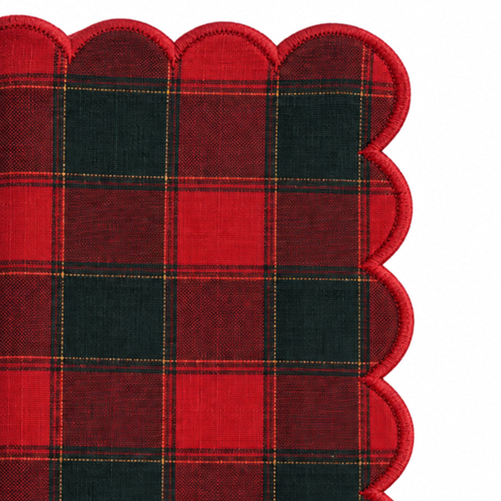 plaid Christmas cloth napkins, featuring festive checks and a decorative scalloped edge. Perfect for Christmas dinners