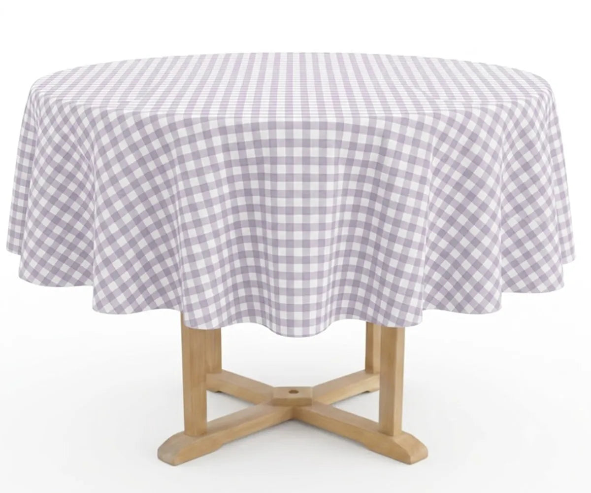 Lavender Round Gingham Tablecloth in 100% cotton featuring a soft lavender and white plaid check pattern, styled on a round dining table for spring gatherings, farmhouse décor, and everyday dining.