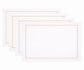 White cotton table napkins with embroidered borders 