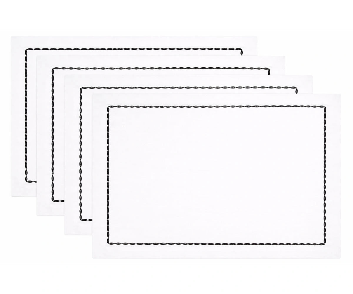 White cotton napkin with black embroidered border