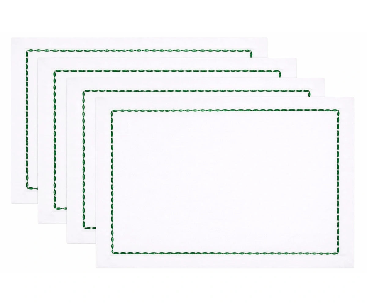 Set of reusable white cotton dinner napkins with decorative stitched edges