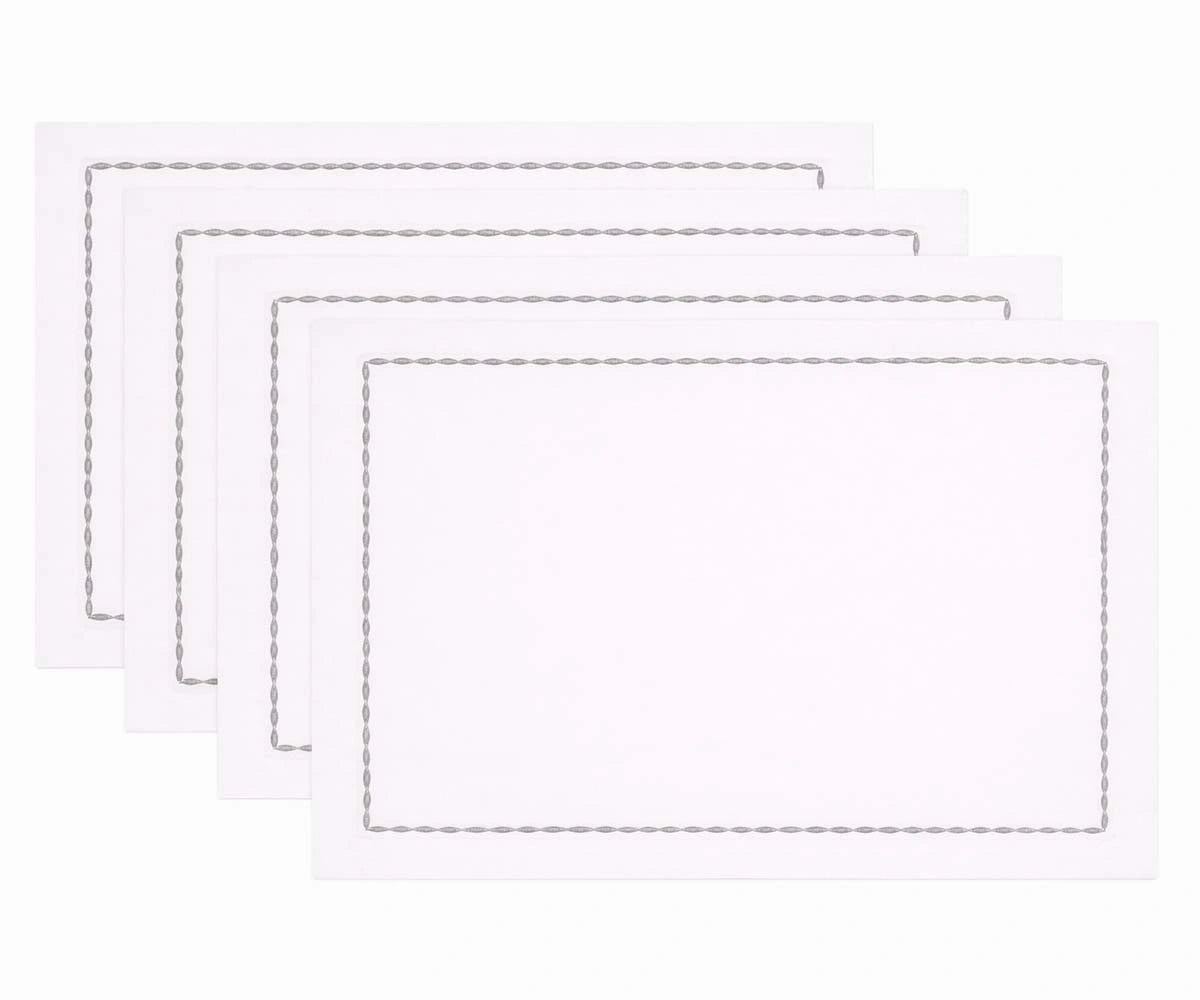 Luxury white cotton napkins with colorful embroidered trim for weddings and events