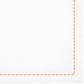 White cotton napkin with beige embroidered border