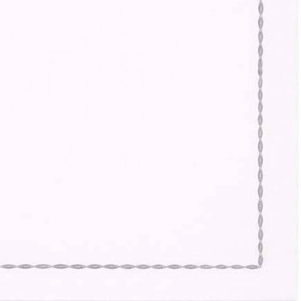 Embroidered white cotton dinner napkins with colorful stitched borders.