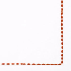 High-quality white cotton napkins with detailed embroidered borders for upscale table presentation