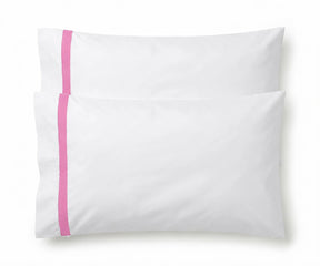 Pair of white cotton pillowcases featuring a single pink embroidered accent border line.