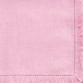 Reusable cotton table napkins with stylish fringe trim along the edges, ideal for dinner parties, weddings, and casual family meals.