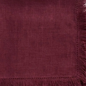 Soft 100% cotton napkins with fringed edges, reusable and machine washable table linens for modern and classic table decor.