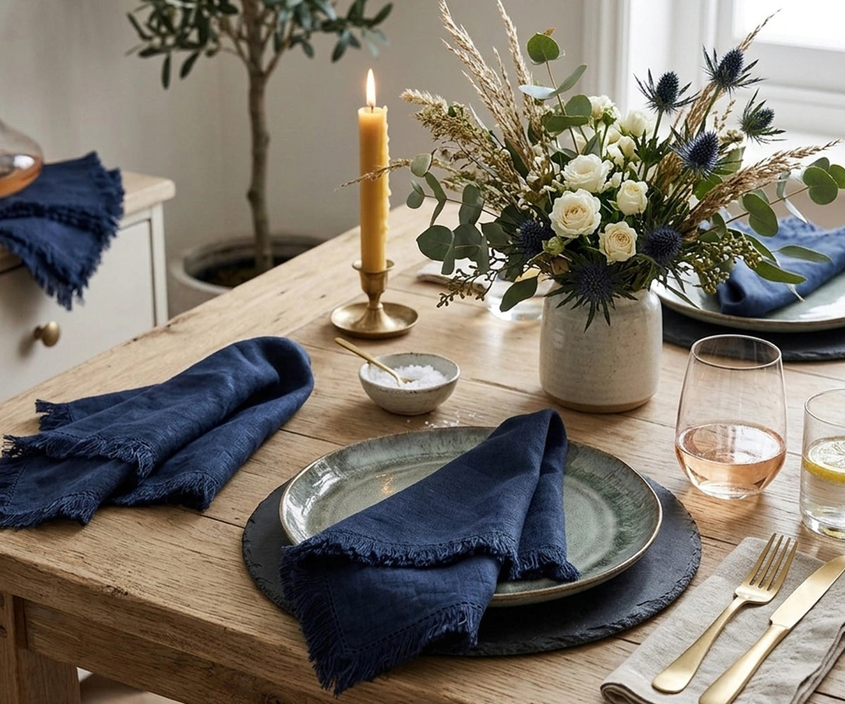 Navy blue cotton fringe napkins with artisan frayed borders, reusable cloth table napkins for coastal dining, farmhouse table settings, holiday dinners, family gatherings, and elegant everyday entertaining