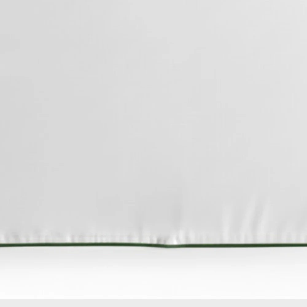 Set of white cotton placemats with green trim